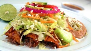 Enchiladas under lettuce