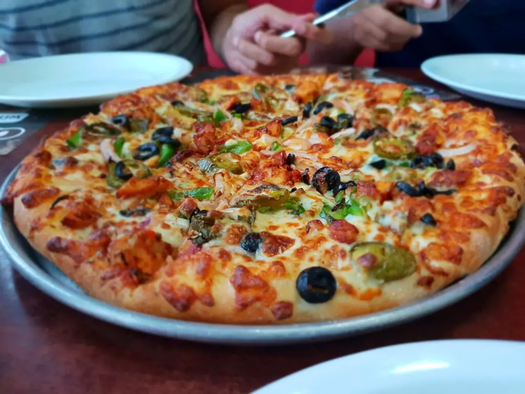 Pizza on stainless steel pan